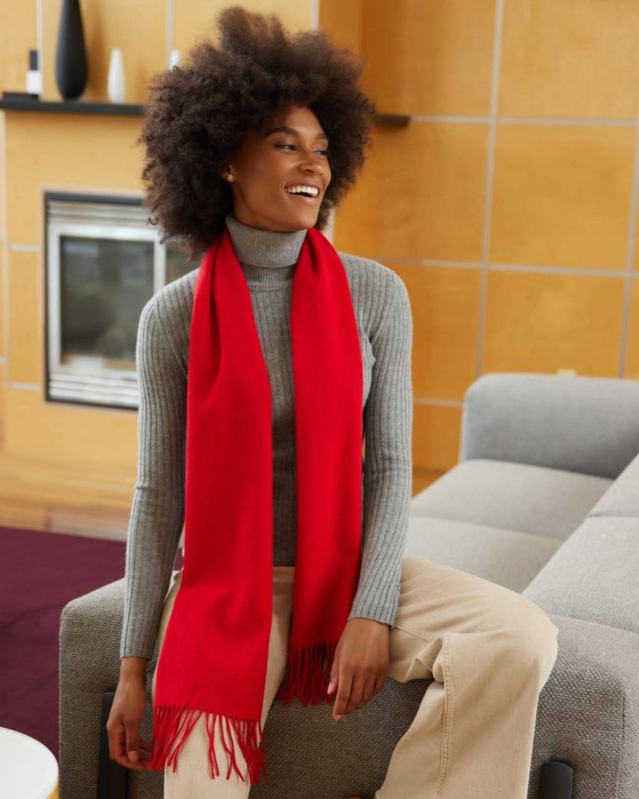 Person wearing 95% Merino 5% Cashmere Woven Scarf

